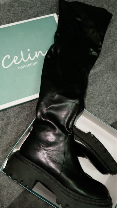 Продаю зимние ботфорты, новые.