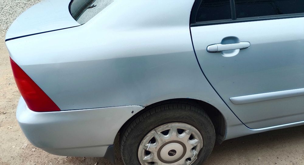 Toyota Corolla 2004 год