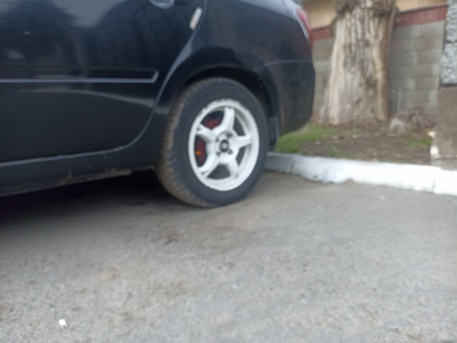 Срочно продам титанки шинами на 14 состояние идиал лета шинами