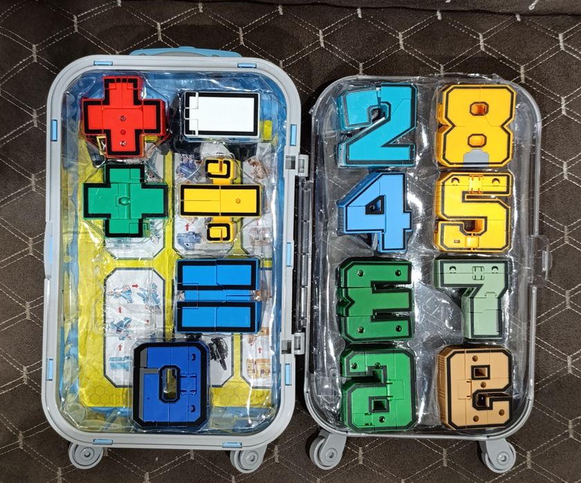 Трансформеры цифры в чемодане