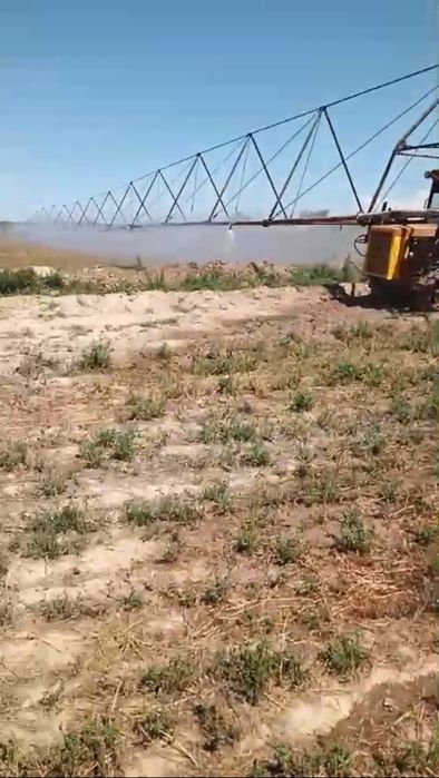 Трактор ДДА-100 с дождевалкой