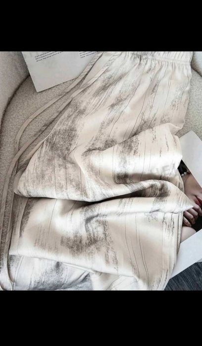 Pantaloni evazați/largi