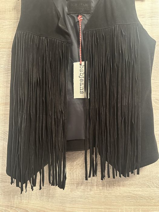 Vesta din piele intoarsa