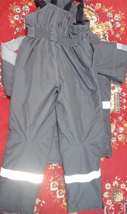 Продам зимнюю курку комбинезон.