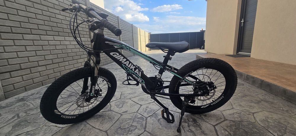 Bicicletă copii 7-10 ani