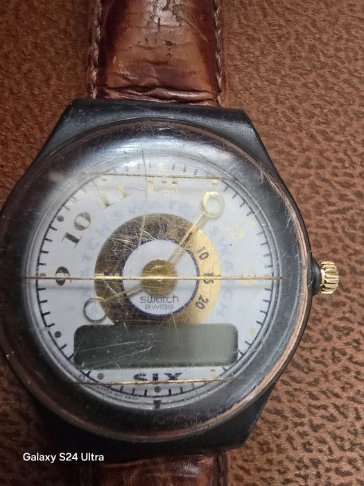 Часовник Swatch six