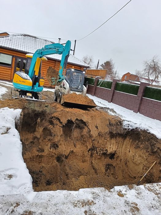 Услугами экскаватор