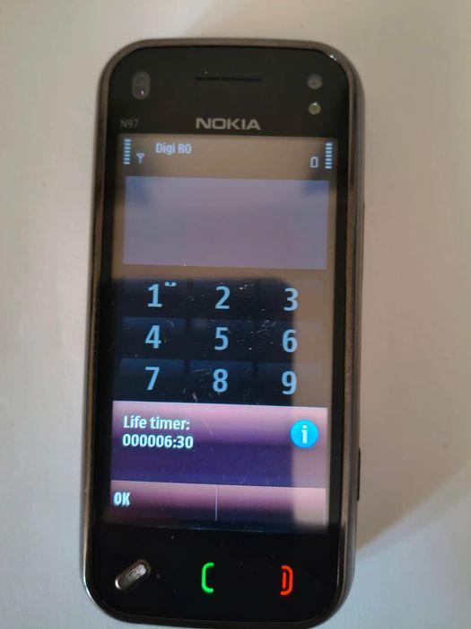 Nokia N97 mini+ incarcator original ( decodat,life timer 6:30)