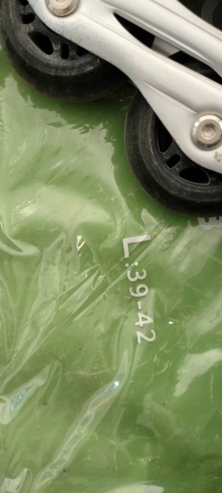 Роликовые коньки