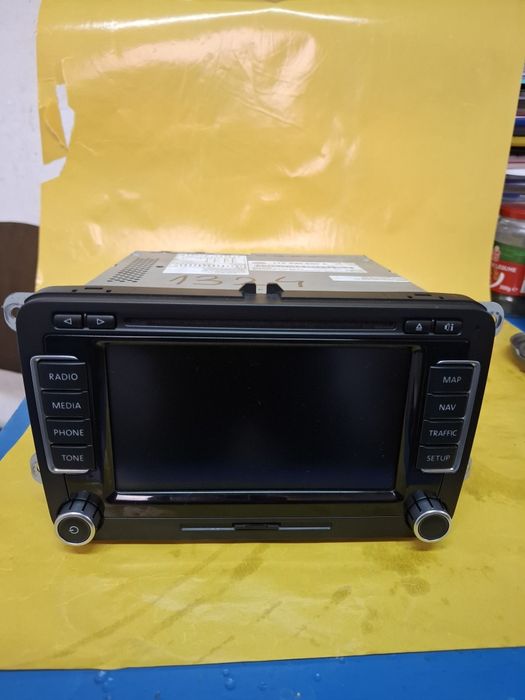 Vand navigatie rns510 vw touran 2012 perfect  functionala cu cod