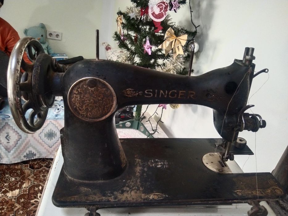 Masina de cusut Singer