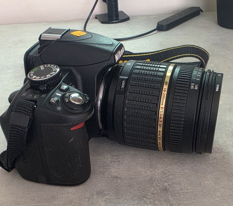 Фотоапарат  D3100