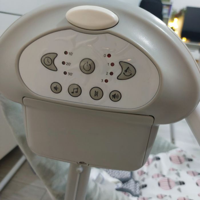 Leagan Kinderkraft Flo, cu melodii, roz cu gri