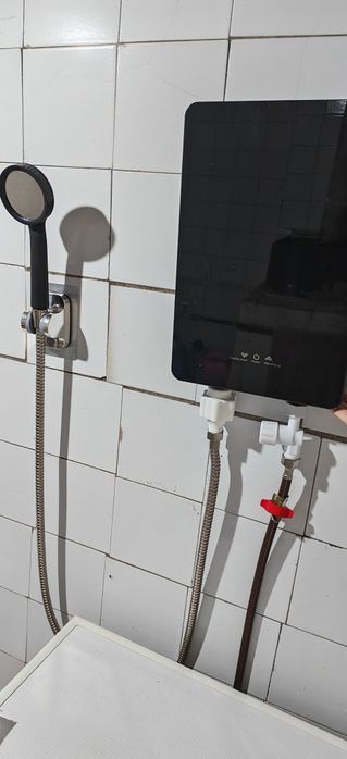 Проточный водонагреватель Аристон