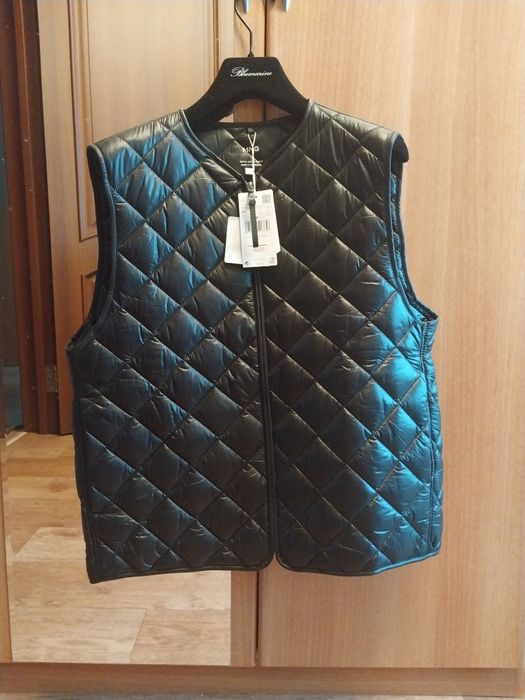 Продам жилет утеплённый Mango.