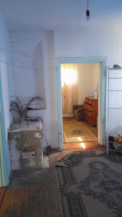 Часть дома 43,9 кв, м , 4 комнаты.  Постройки, сад.