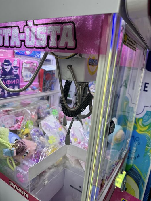 Игровой аппарат хватайка