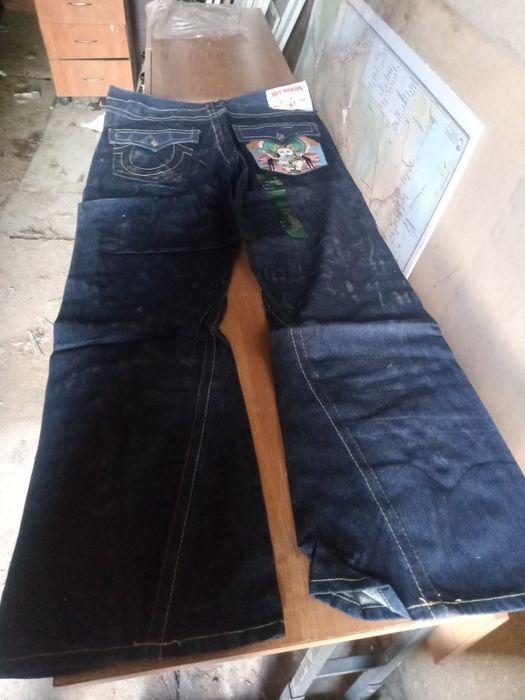 Джинсовые брюки с писовкой