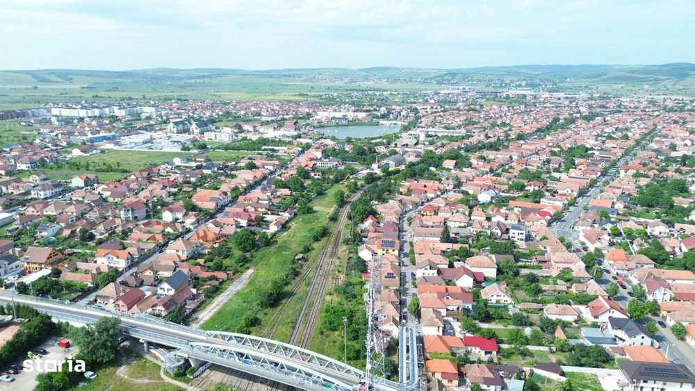 Teren intravilan 16058 mp + hale Calea Surii Mici