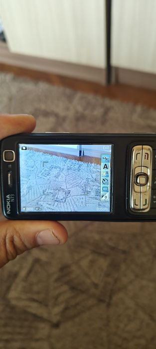 Nokia N73 perfect funcțional.card de 512mb