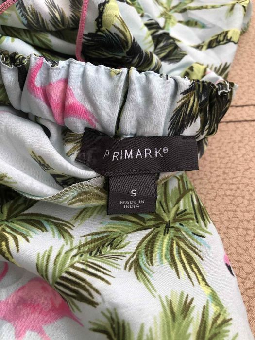 Плажен гащеризон с V-образно деколте и гол гръб