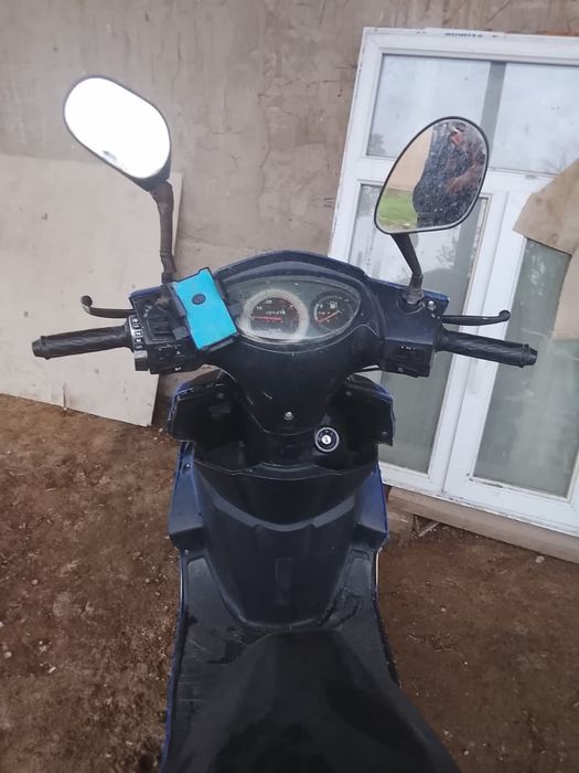 Скутер бензиновый