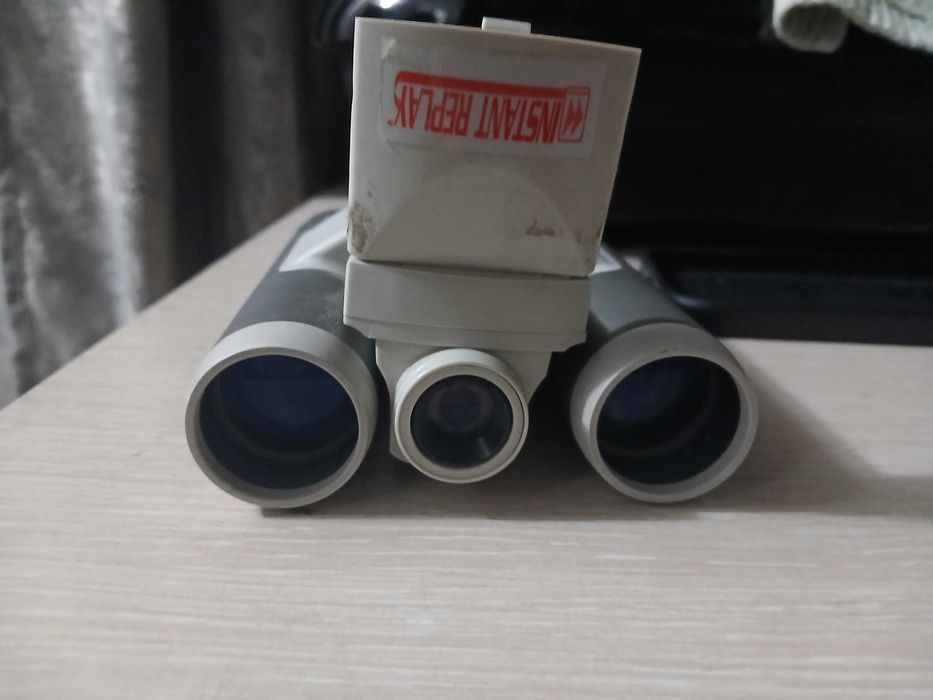 Цифровой бинокль Bushnell с камерой.