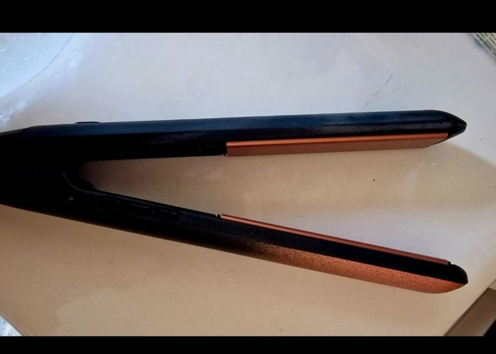 Vând placa de par Remington