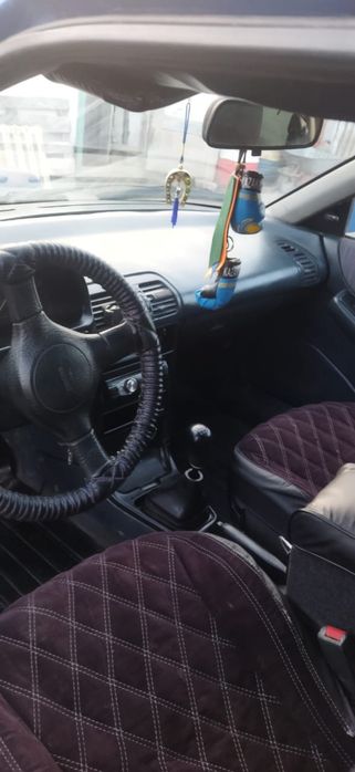 Мазда 323 F Автомобиль