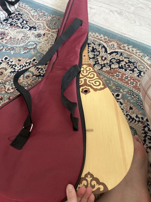 Домбыра новый қолданылмаған