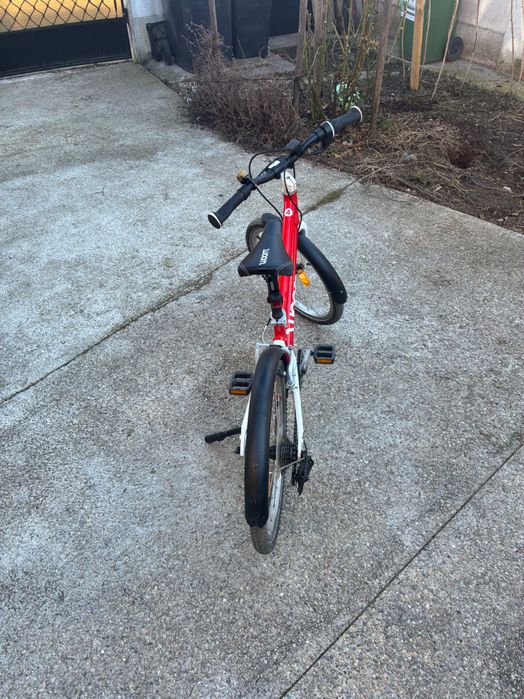 bicicletă Woom 4, roșie, apărători, lumini, sonerie