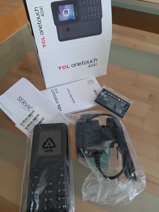 Мобилен телефон TCL onetouch Нов