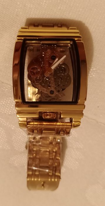 Новые часы скелетон мужские позолоченые