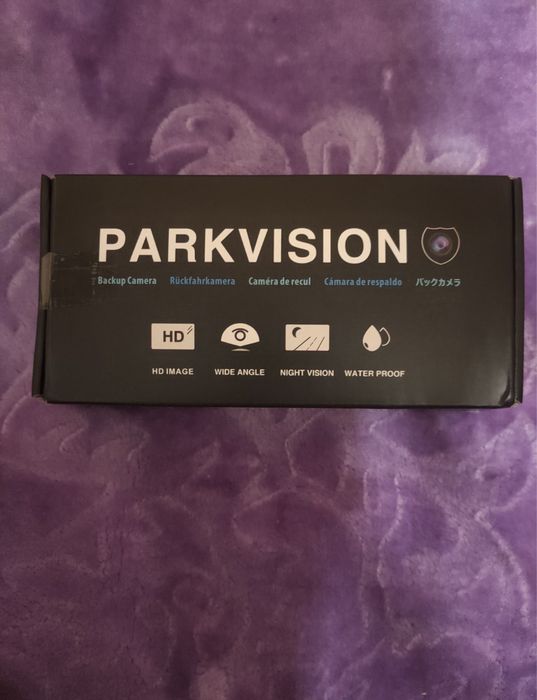 Cameră de vedere frontală cu obiectiv rotativ