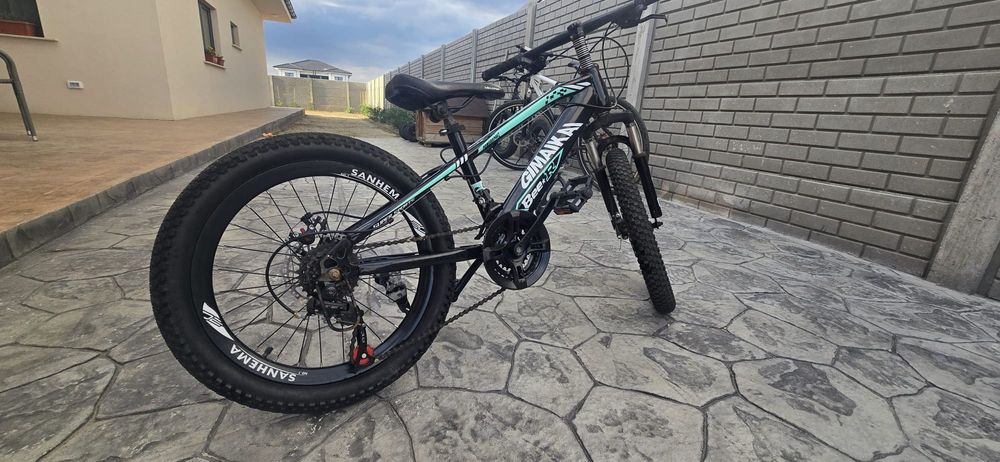 Bicicletă copii 7-10 ani