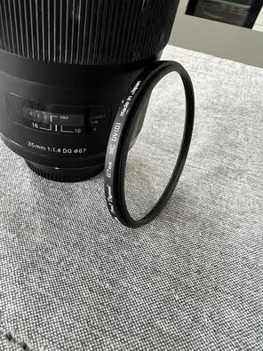 Obiectiv Sigma 35mm F1.4 DG + filtru hoya montura Nikon