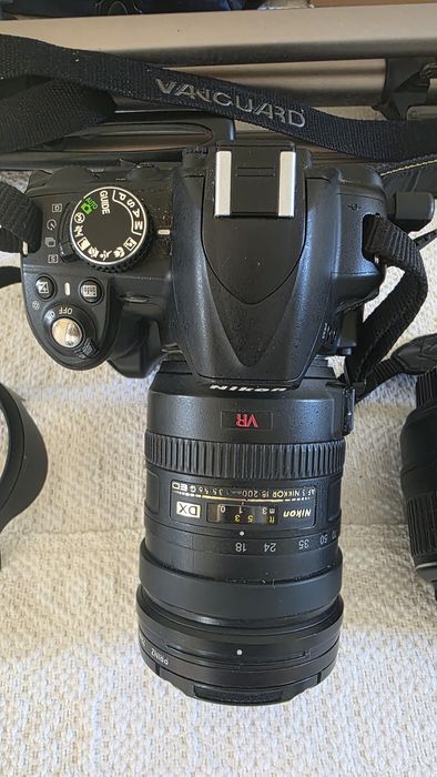 Nikon D3100 – Kit complet, stare foarte bună, doar ~20.600 cadre