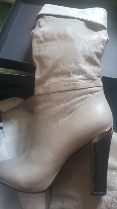 Новые кожанные сапоги