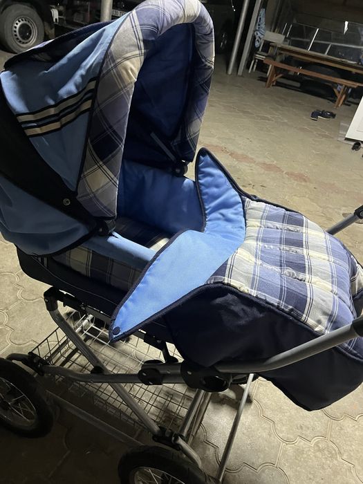 Детская коляска синяя