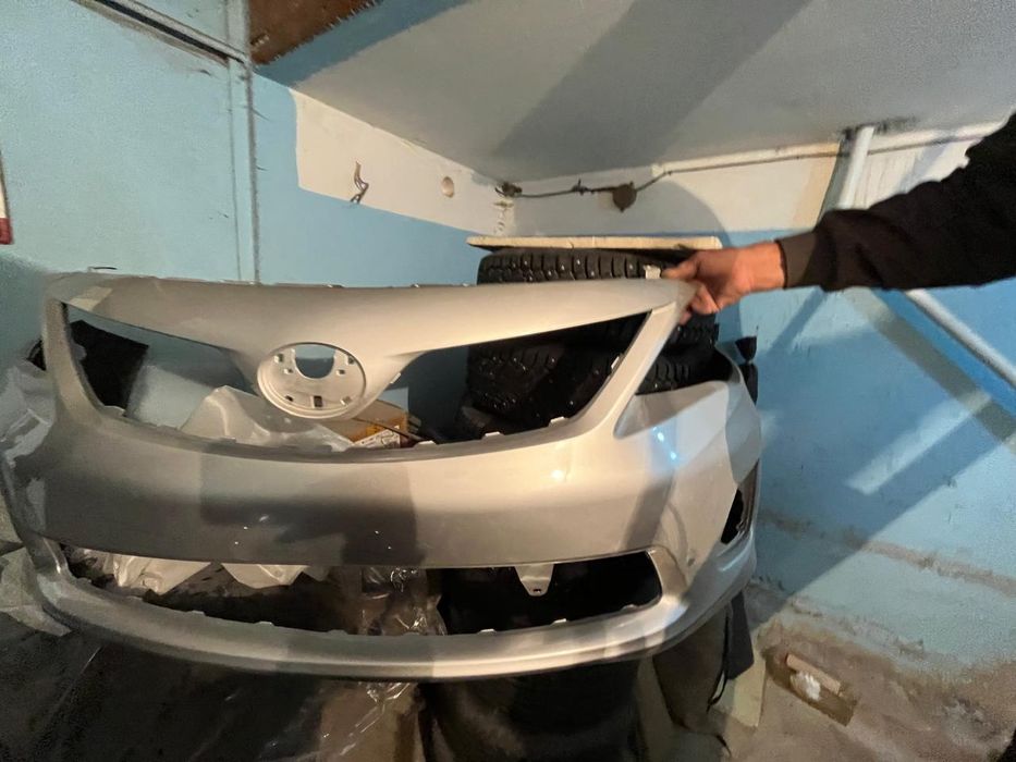 Передний бампер Toyota corolla