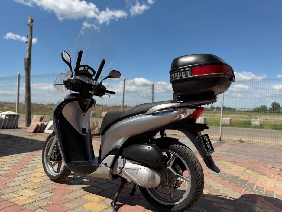 Honda sh 125i 2009 acte Germania se conduce cu categoria B