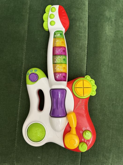 Продам игрушку гитару