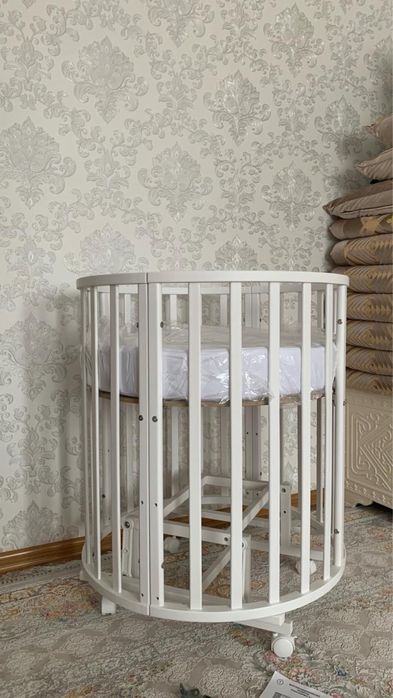 Круглая детская кроватка-трансформер 9/1