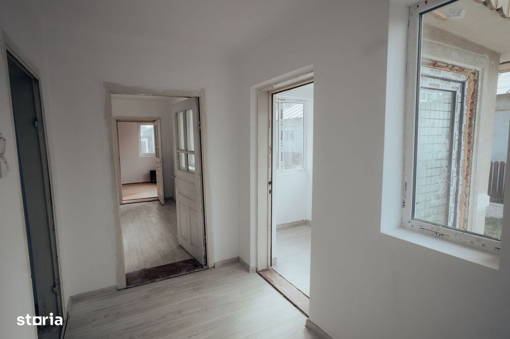 Casa renovata cu teren generos 1186 mp, inconjurata de padure