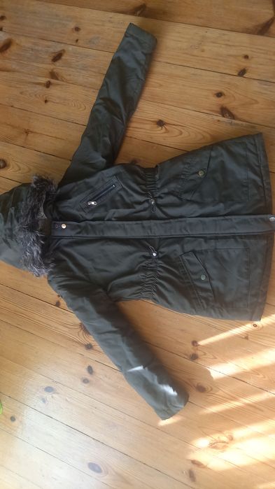 Масленост зелено яке.Подходящо за есенния и зимен период.