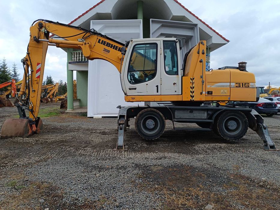 Excavator pe roti Liebherr A316, 21 tone, pentru manipulare, 2009