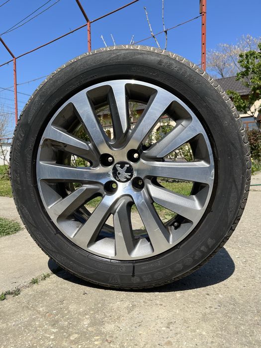 Vamd roti  aliaj cu anvelope de vara originale Peugeot 215/55/R17