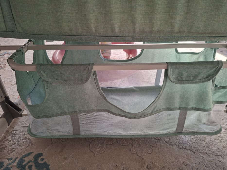 Продается манеж-шезлонг электронный.