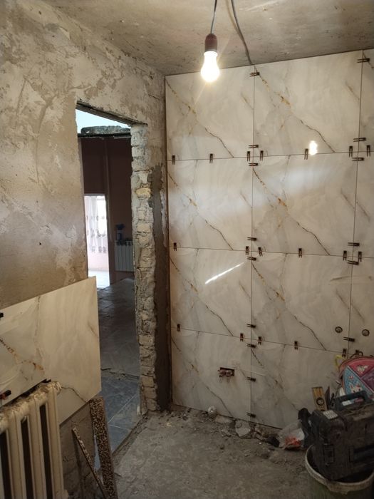 Кафельшик плиточник