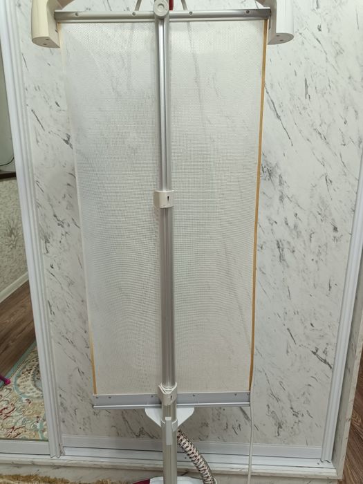 Продам вертикальный отпариватель Tefal